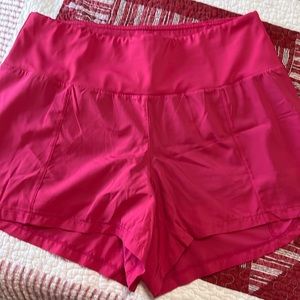 Women’s CVG hot pink running shorts